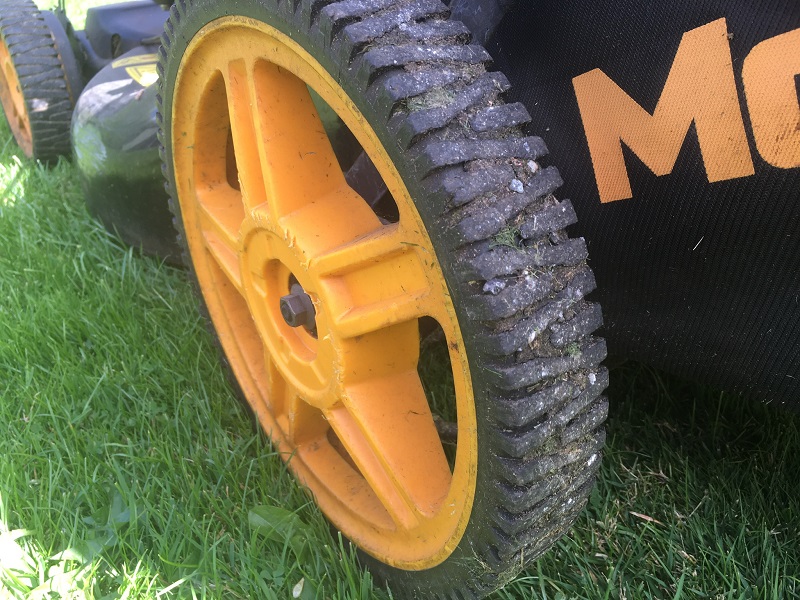 why high rear wheels on lawn mower