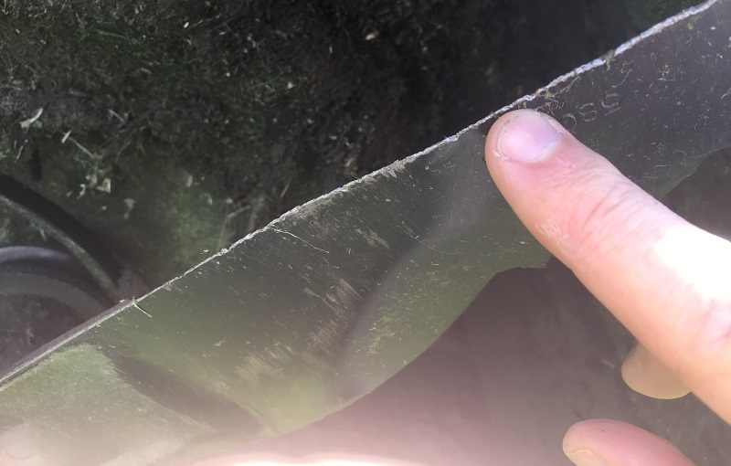 Check the condition of your lawn mower blade before tightening