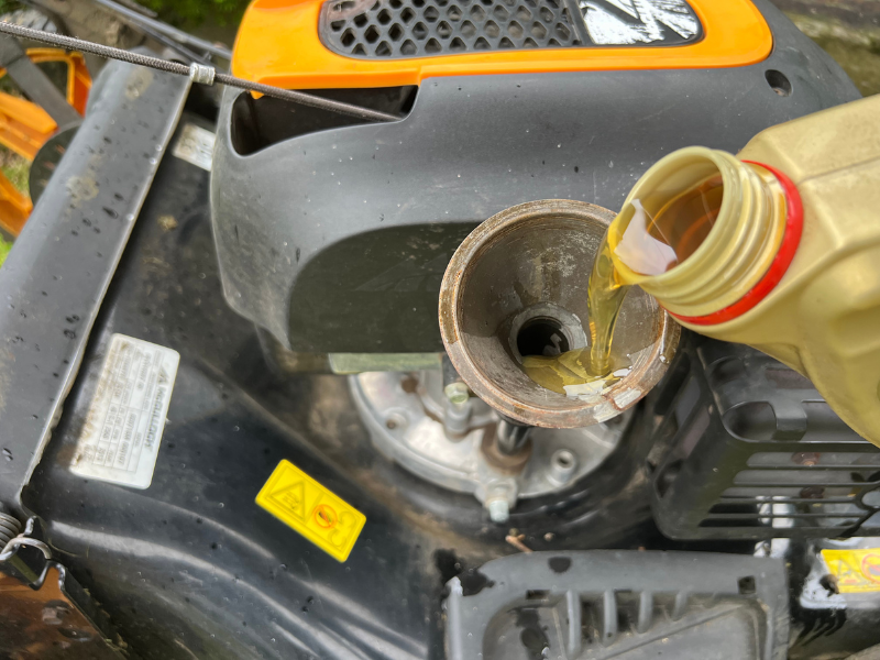 overfilling engine oil can cause white or blue smoke