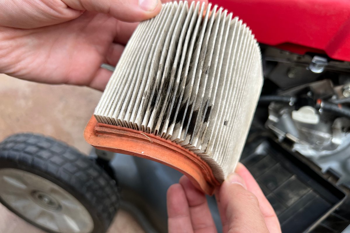 oil on clogged up paper lawn mower air filter causing starting issues