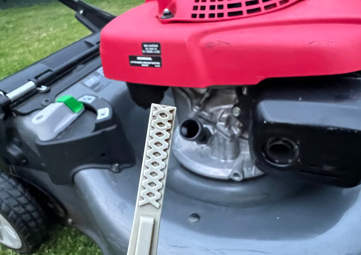 Lawn mower is low on oil after checking with dipstick