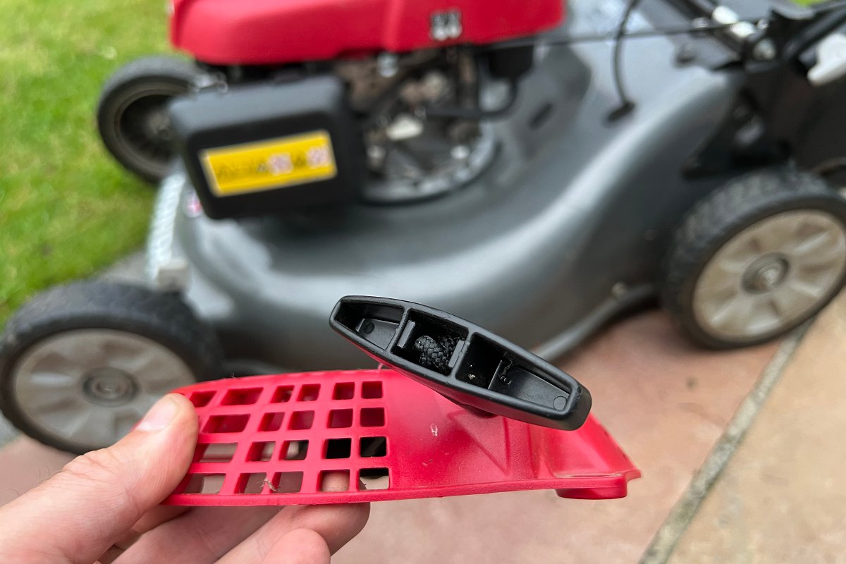recoil starter removed from lawn mower